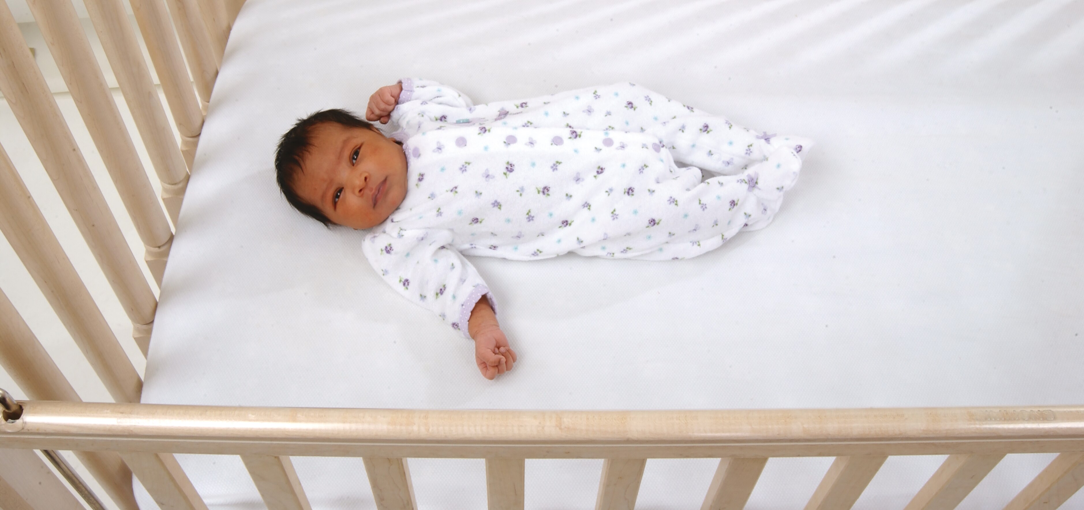 Baby put in crib on back to sleep