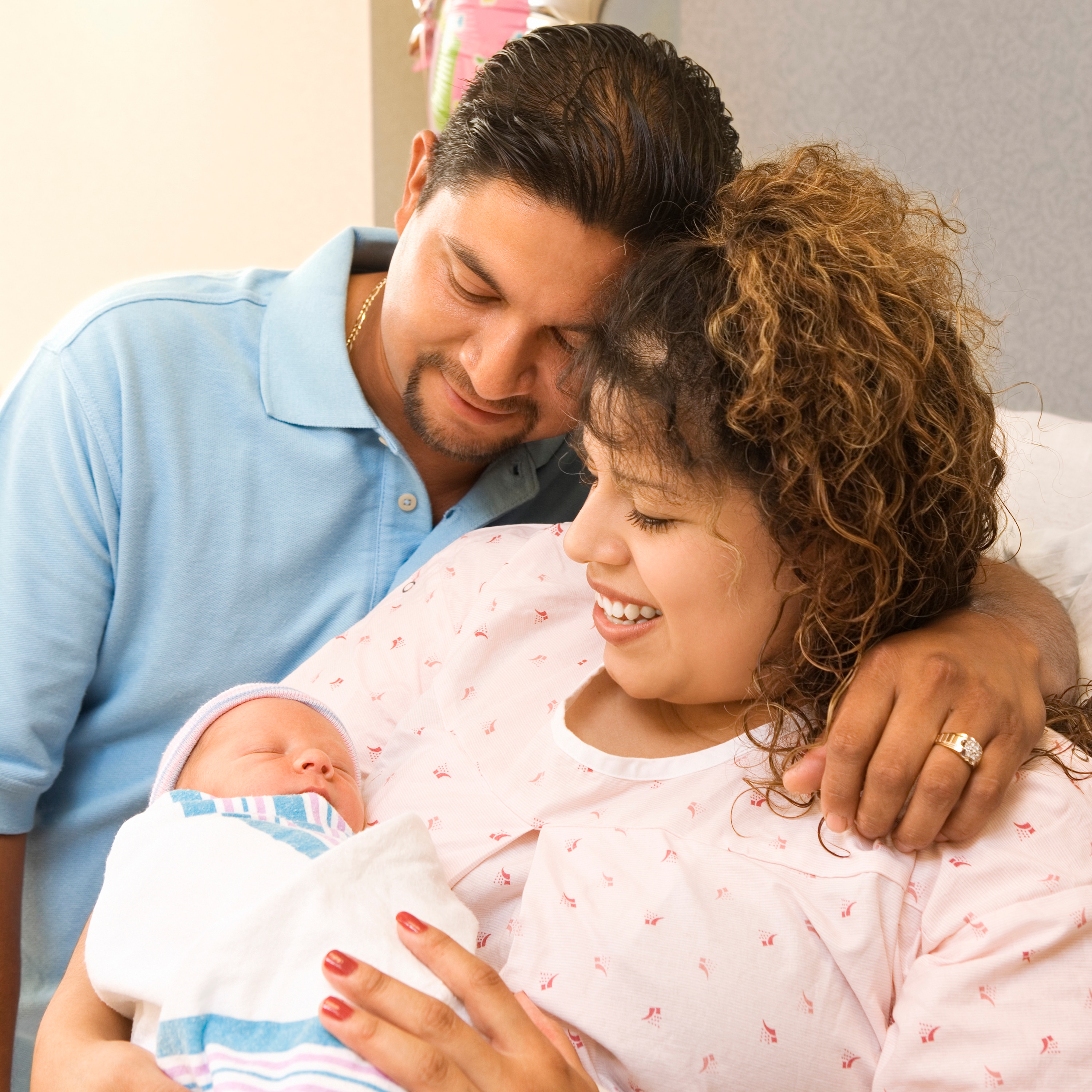 Loving parents admiring their newborn