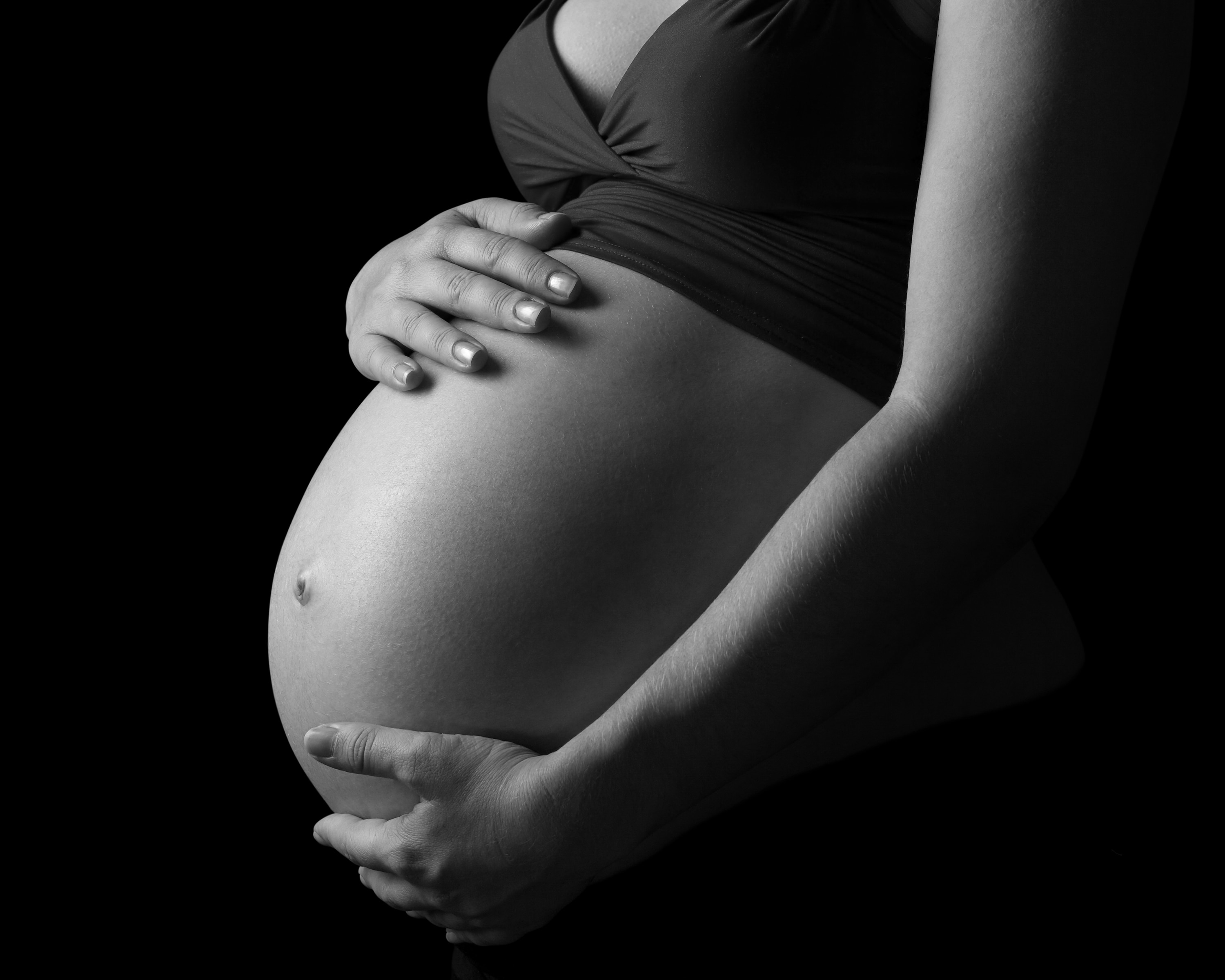 Pregnant belly shown in black and white