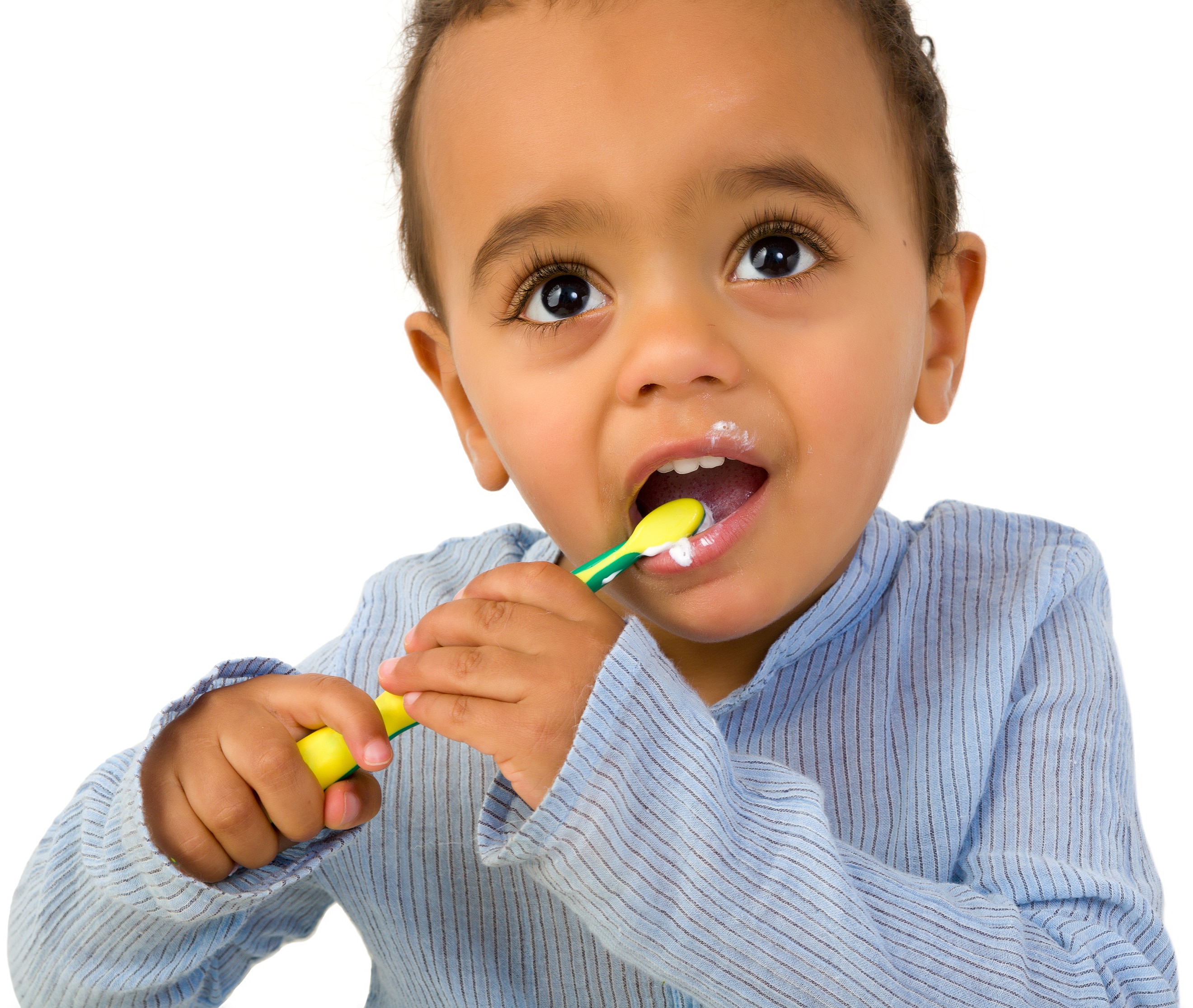 Young boy brushing his teeth